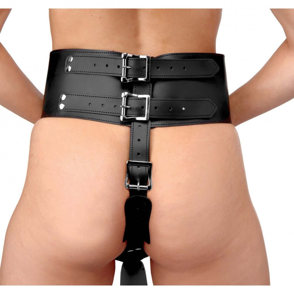 Girl wearing a forced orgasm wand holder belt, constructed from soft, comfortable materials designed for intimate pleasure